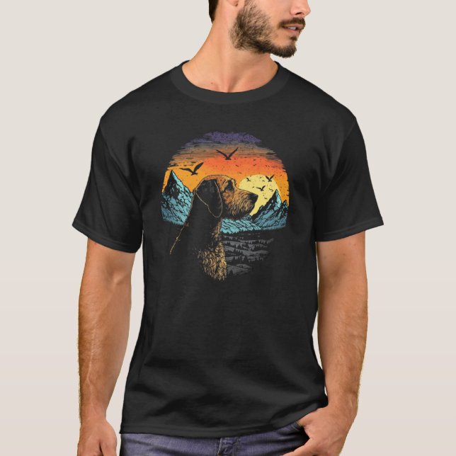 Airedale Terrier Dog and Sun Rising Over Mountains T-Shirt (Front)