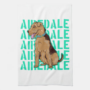 Airedale terrier sitting down tea towel