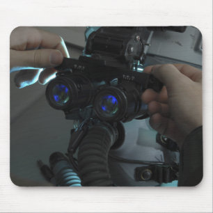 Airman adjusts the eyespan mouse mat