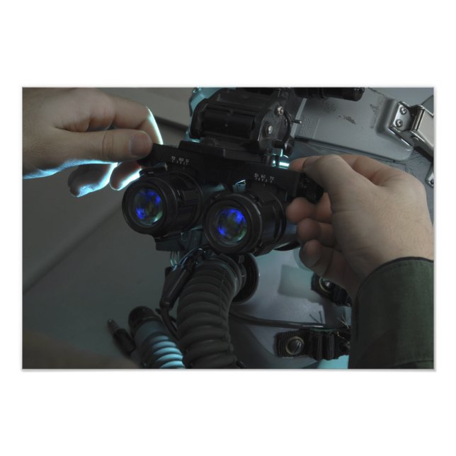 Airman adjusts the eyespan photo print (Front)