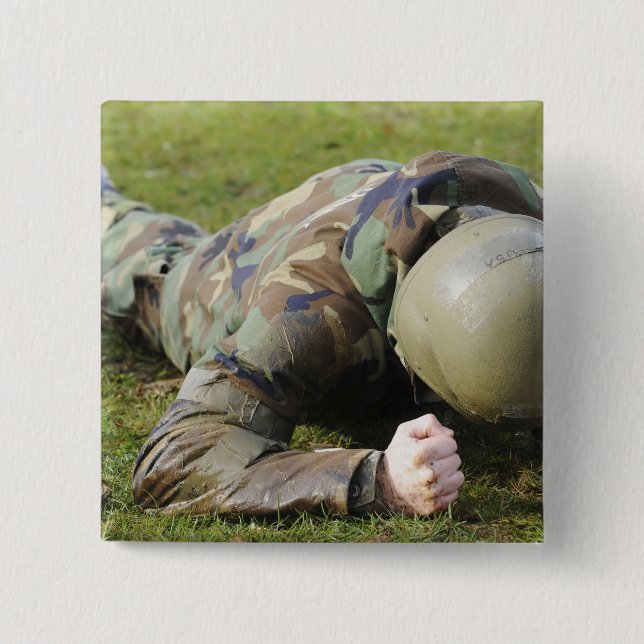 Airman crawls through a wet field 15 cm square badge (Front)