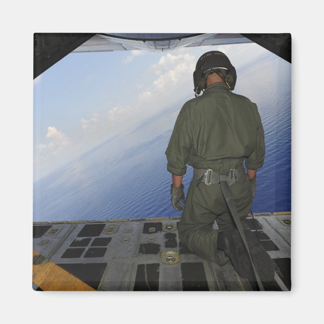 Airman observes the waters of the Gulf of Mexic Magnet (Front)