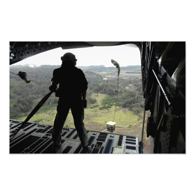 Airman watches a practice bundle fall photo print (Front)