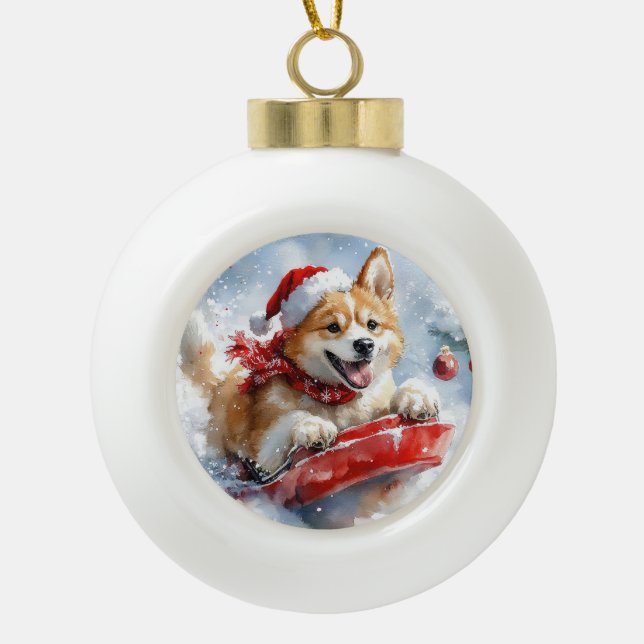Akita Dog in Sledge Let it Snow Christmas Ceramic Ball Christmas Ornament (Front)