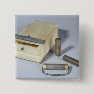 Alabaster box and bronze and silver seal cylinders 15 cm square badge