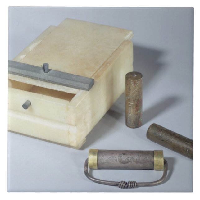 Alabaster box and bronze and silver seal cylinders tile (Front)