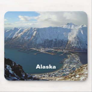 Alaskan Mountain Range and City Below Mouse Mat