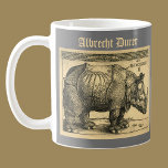 Albrecht Durer Rhinoceros woodcut Renaissance art Coffee Mug<br><div class="desc">Coffee mug with the woodcut by Albrecht Durer, portrait of the famous rhinoceros -this not the more famous Clara, the rhino: it is the one which was given to the King of Portugal, as stated on writing above the image, although Durer made an imaginary portrait of her here, as he...</div>