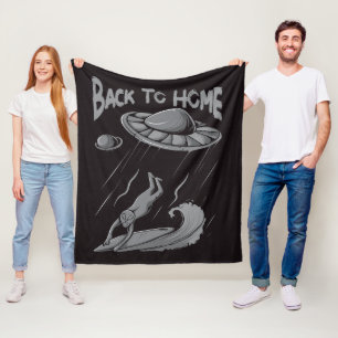 alien ufo surfing illustration with back to home fleece blanket