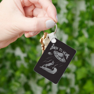 alien ufo surfing illustration with back to home key ring