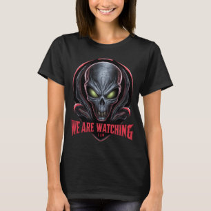 Alien with Glowing Green Eyes We are Watching T-Shirt