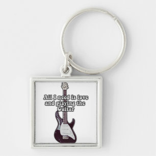 All i need is love and playing the guitar. vintage key ring