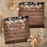 All In One Rustic Wood String Light Square Wedding Invitation<br><div class="desc">A rustic wedding invitation featuring pretty string lights and a delicate hand-drawn rustic floral garland of botanical leaf foliage with stylish script typography,  on a rustic wood background. Personalize with all your special wedding day information on the reverse including your RSVP,  accommodation,  and additional details. Designed by Thisisnotme©</div>