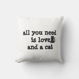 ALL YOU NEED IS LOVE AND A CAT CUSHION