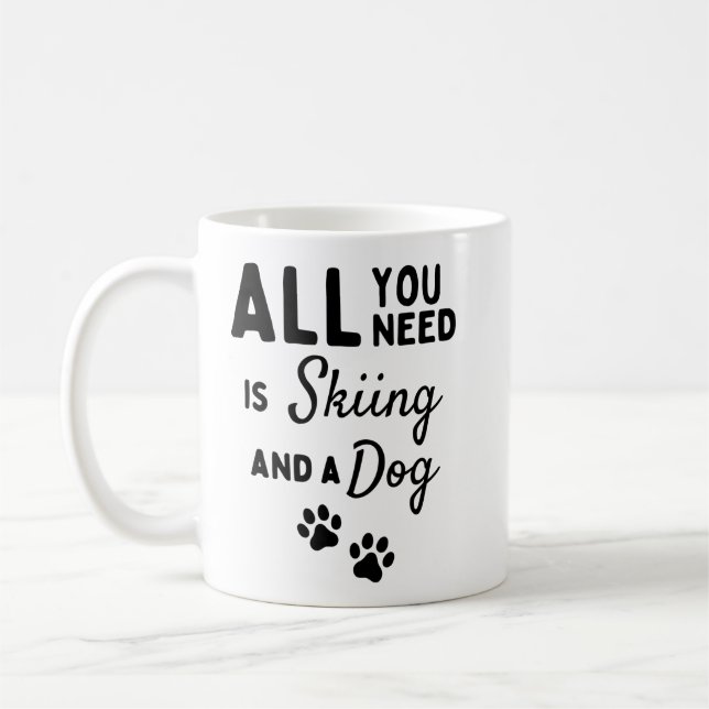 All you need is skiing and a dog. coffee mug (Left)