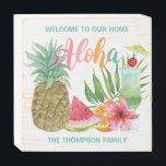 Aloha Welcome Tropical Fruit Pineapple Wooden Box Sign<br><div class="desc">Tropical "Welcome to our home" rustic wood box sign featuring a colourful "Aloha" greeting, watercolor fruit (pineapple, watermelon, orange), an icy cocktail glass with festive drink umbrella and a pink hibiscus flower and palm leaf. Great for a housewarming gift, and Hawaiian, luau, tiki and beach themes. The greeting and name...</div>