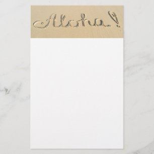 Aloha word sign on the beach sand stationery