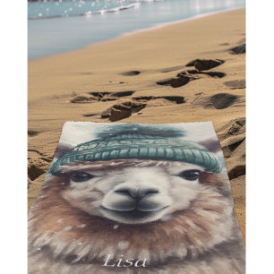 Alpaca wearing blue beanie, customisable beach towel
