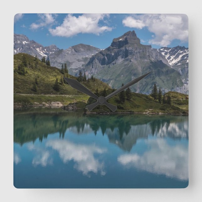 amazing nature design in the swiss mountains square wall clock (Front)