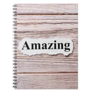 AMAZING of the word on paper. concept. Words of AM Notebook
