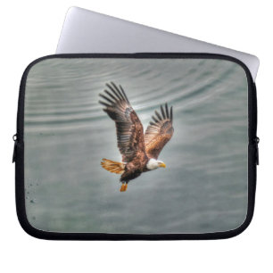 American Bald Eagle Flying Over Ocean Laptop Sleeve