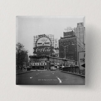 American city with commercial billboards 15 cm square badge