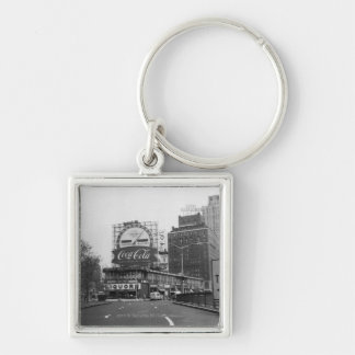 American city with commercial billboards key ring