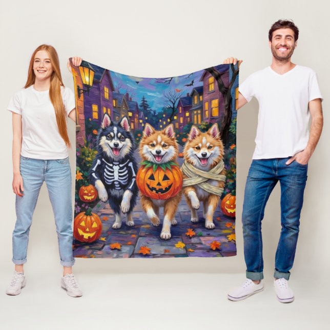 American Eskimo Dogs Trick-or-Treating Halloween Fleece Blanket (In Situ)