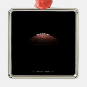 American football ball on black background metal tree decoration