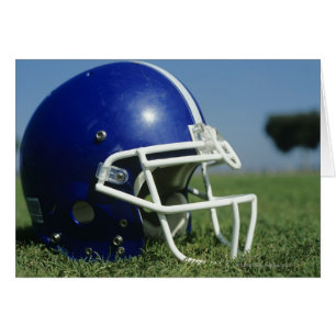American football helmet in grass,close-up