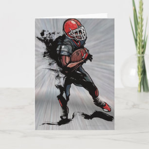 American football player holding football card