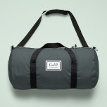 American Nostalgia Classic Simple Minimal Green Duffle Bag<br><div class="desc">This american nostalgia style classic design in dusky green features a patch style emblem with a monogram name and framed border,  featuring informal handwritten script and modern block typography. The text can be customised with your name for a design as unique as you are!</div>