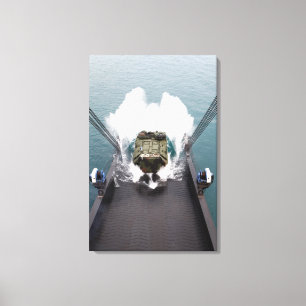 Amphibious assault vehicles disembark from USNS Canvas Print