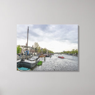 Amsterdam boats on a canal canvas print