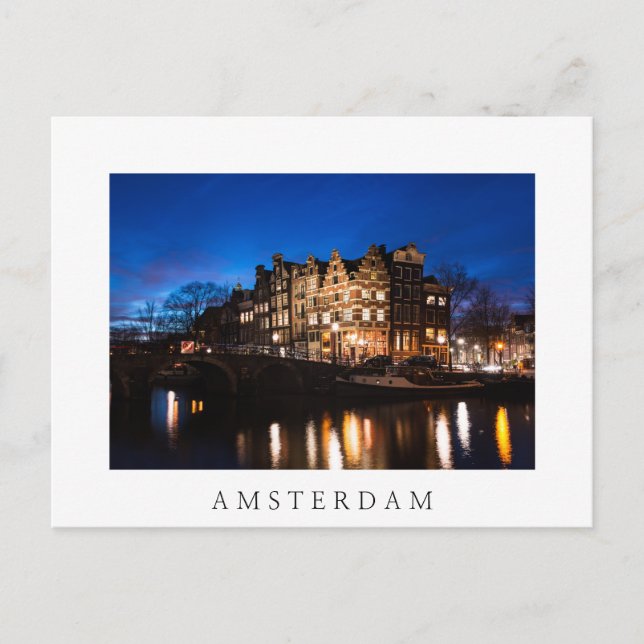 Amsterdam canal houses at night postcard (Front)