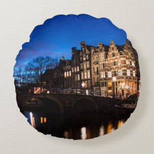 Amsterdam canal houses at night round cushion