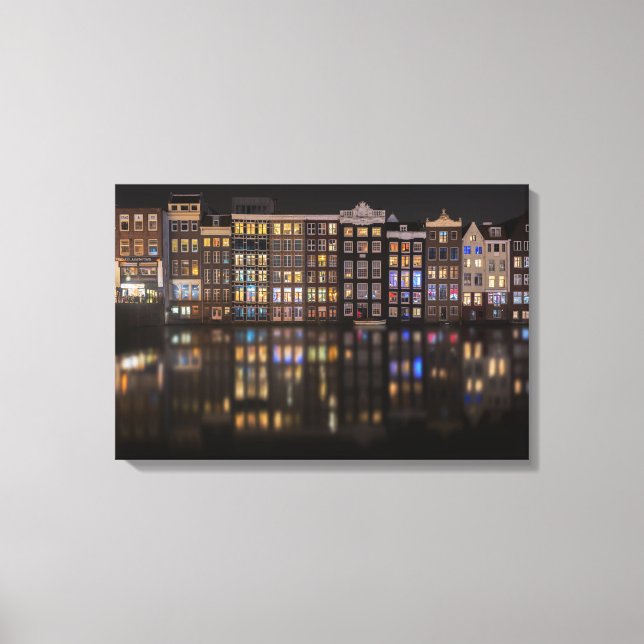 Amsterdam houses with colourful lights in the nigh canvas print (Front)
