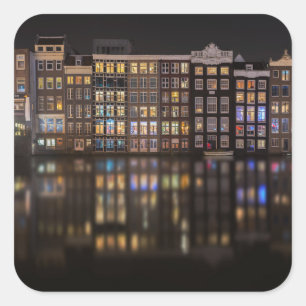 Amsterdam houses with colourful lights in the nigh square sticker
