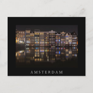 Amsterdam houses with colourful lights in the postcard