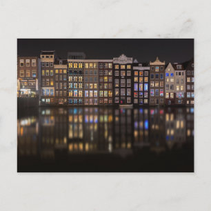 Amsterdam houses with colourful lights in the postcard
