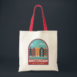 Amsterdam Netherlands Travel Art Vintage Tote Bag<br><div class="desc">Amsterdam retro vector travel design in an emblem style. It’s known for its artistic heritage,  elaborate canal system and narrow houses with gabled facades,  legacies of the city’s 17th-century Golden Age.</div>