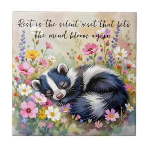 An Adorable Skunk Napping in Flowers and Quote Tile