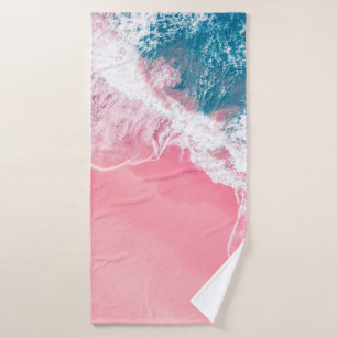 An aerial view of a pink sandy beach in New South Bath Towel