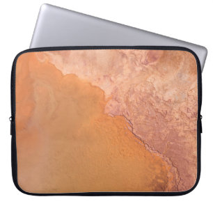 AN AERIAL VIEW OF THE VIBRANT AND COLORFUL WATERS LAPTOP SLEEVE