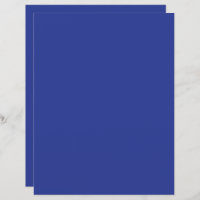 an aeroplane flying in the sky with a blue backgro