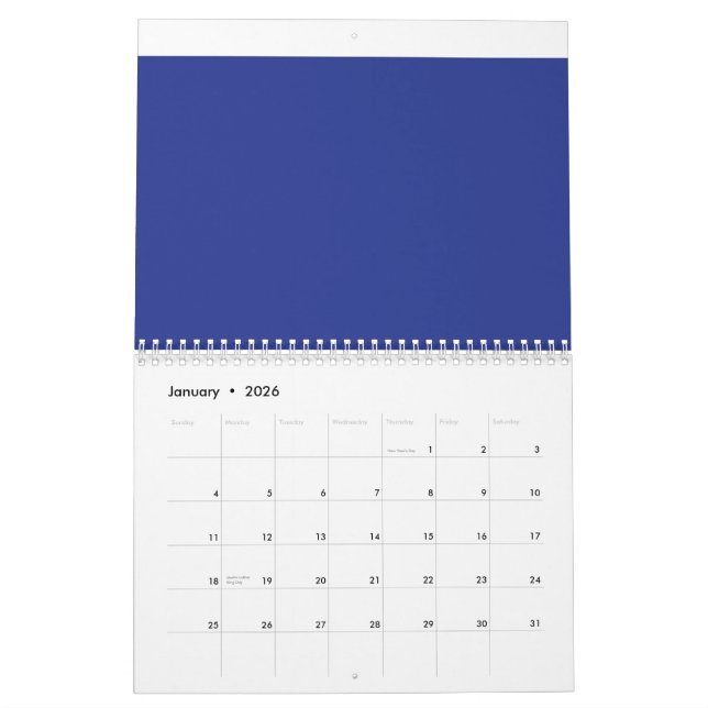 an aeroplane flying in the sky with a blue backgro calendar (Jan 2026)