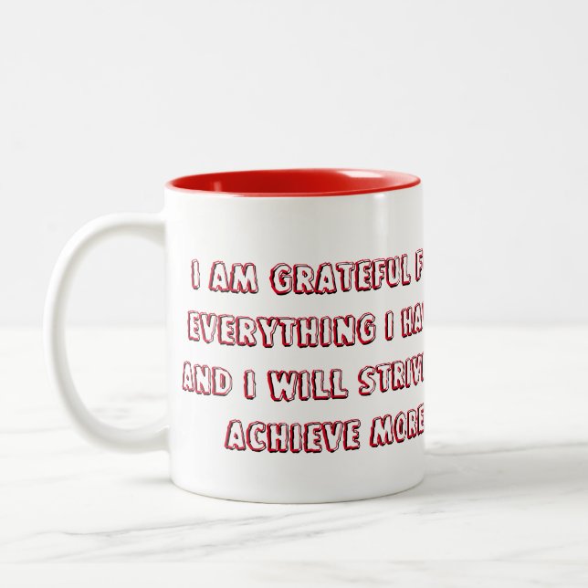 An affirmative and positive statement Two-Tone coffee mug (Left)