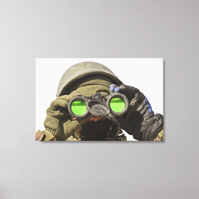 An Afghan soldier scans the horizon Canvas Print (Front)