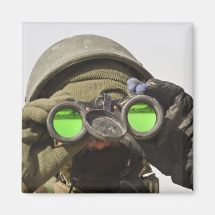 An Afghan soldier scans the horizon Magnet