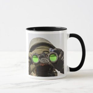 An Afghan soldier scans the horizon Mug